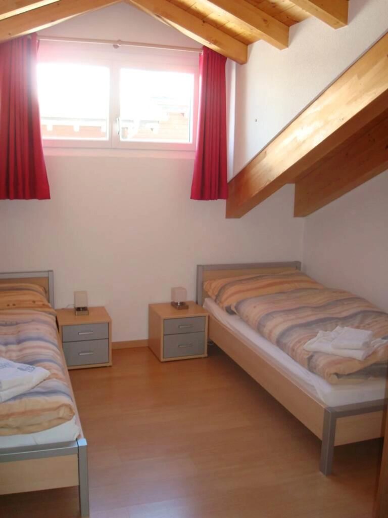 Schlafzimmer mit Einzelbetten