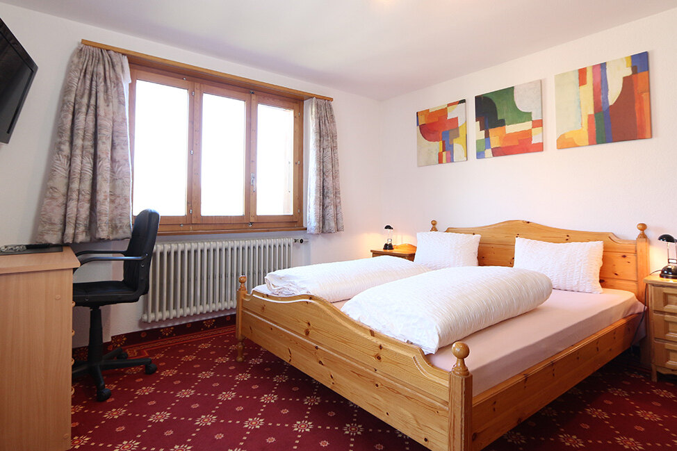 Gemütliches Doppelzimmer im Hotel Alpina